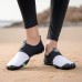 Green and Black Men's Barefoot Water Shoes with Slip-On Design and Colorful Soles for Beach and Water Activities