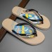 Men's Artistic Flip-Flops with Blue and Yellow Comic Print - Perfect for Casual Outings and Beach Days