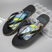 Men's Artistic Flip-Flops with Blue and Yellow Comic Print - Perfect for Casual Outings and Beach Days