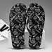 Youthful Black Flip-Flops with Cartoon Skull Print - Fun and Edgy Footwear for Concerts and Festive Casual Outings